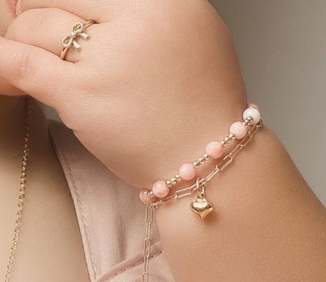 Elegant baby bracelet with gold and pink accents – Blissful Bundlz